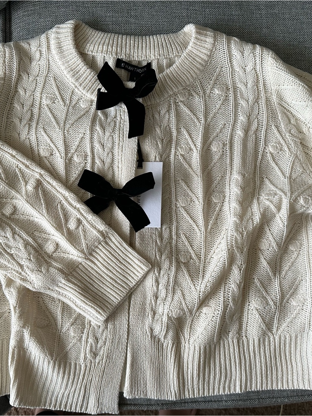41 Hawthorn Cream Cable Knit Cardigan with Black Bow Accents